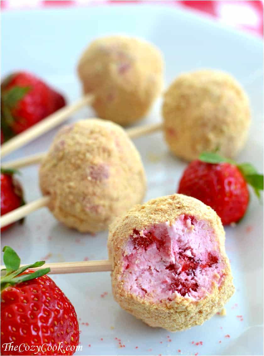 These decadent no-bake Strawberry Cheesecake pops are so easy to make & a perfect bite-sized treat. No-Bake-Strawberry-Cheesecake-Pops