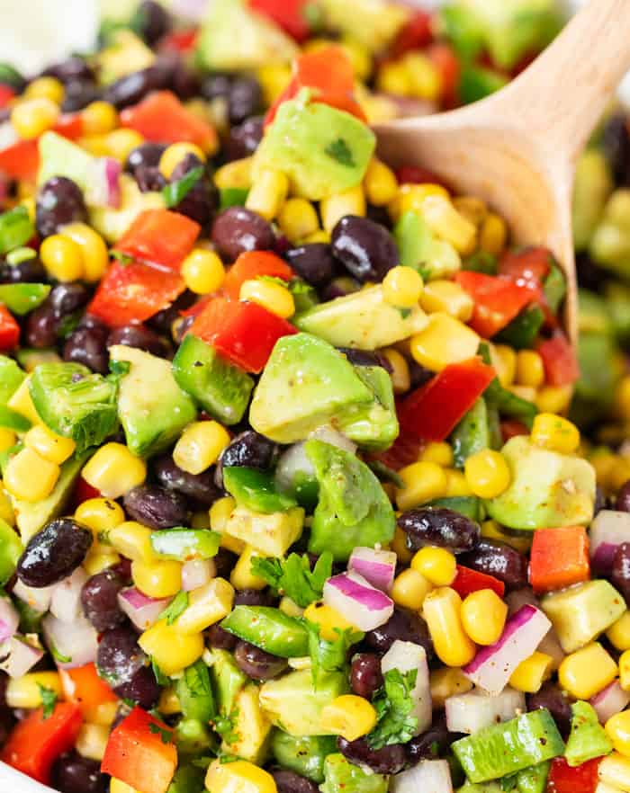 A wooden spoon scooping up cowboy caviar.